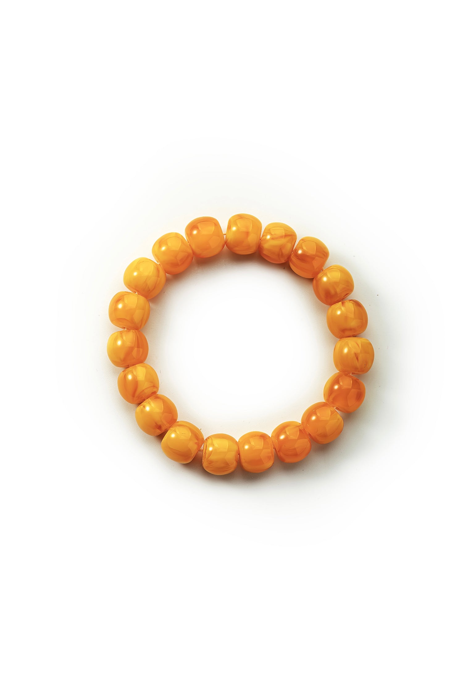 Orange beaded bracelet on a white background