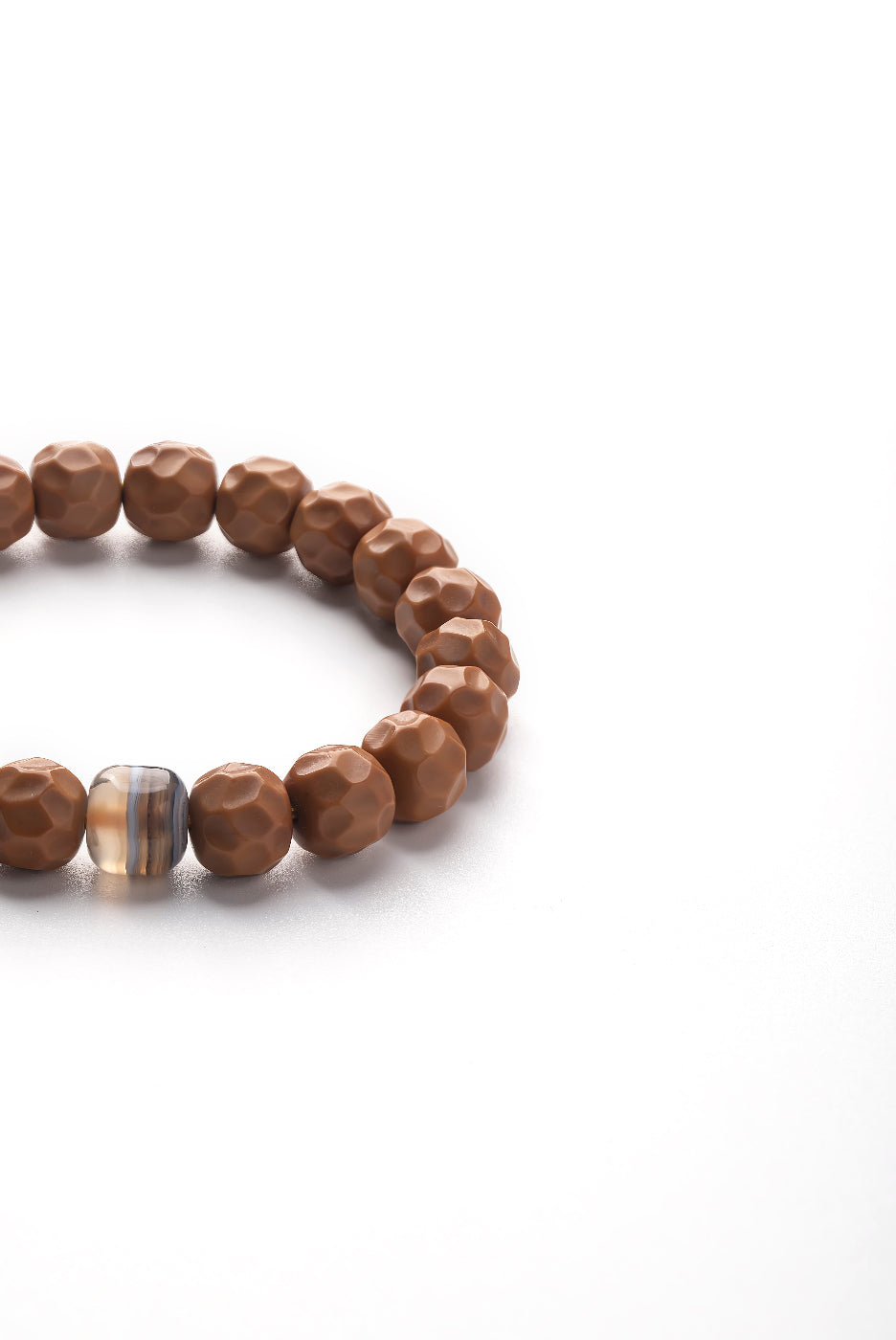 Wooden beaded bracelet on a white background